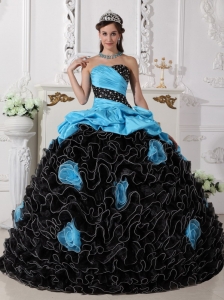 Blue and Black Quinceanera Dress with Beading and Rolling Flowers