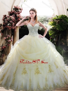 Custom Designed White Quinceanera Gown with Appliques and Beading