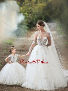 Feminine See Through Long Sleeves Wedding Dresses with Appliques and Lovely Big Puffy Flower Girl Dress with Hand Made Flowers
