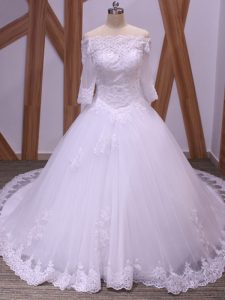 Eye-catching White Backless Wedding Gown Lace Half Sleeves Brush Train