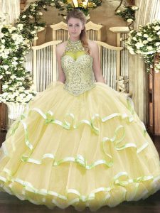 Light Yellow Ball Gowns Halter Top Sleeveless Organza and Tulle Floor Length Lace Up Beading and Ruffled Layers Sweet 16 Dresses