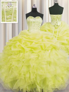 Visible Boning Sleeveless Organza Floor Length Lace Up Ball Gown Prom Dress in Yellow with Beading and Ruffles and Pick Ups